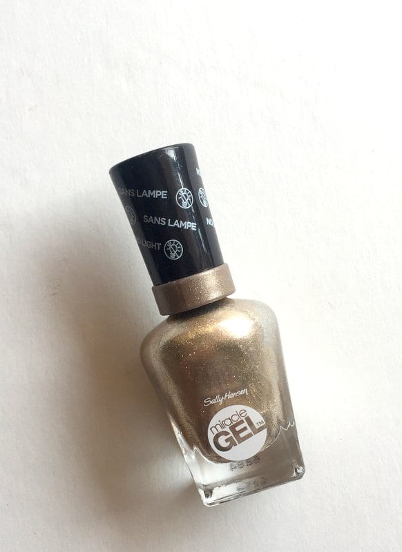 Gold nail polish