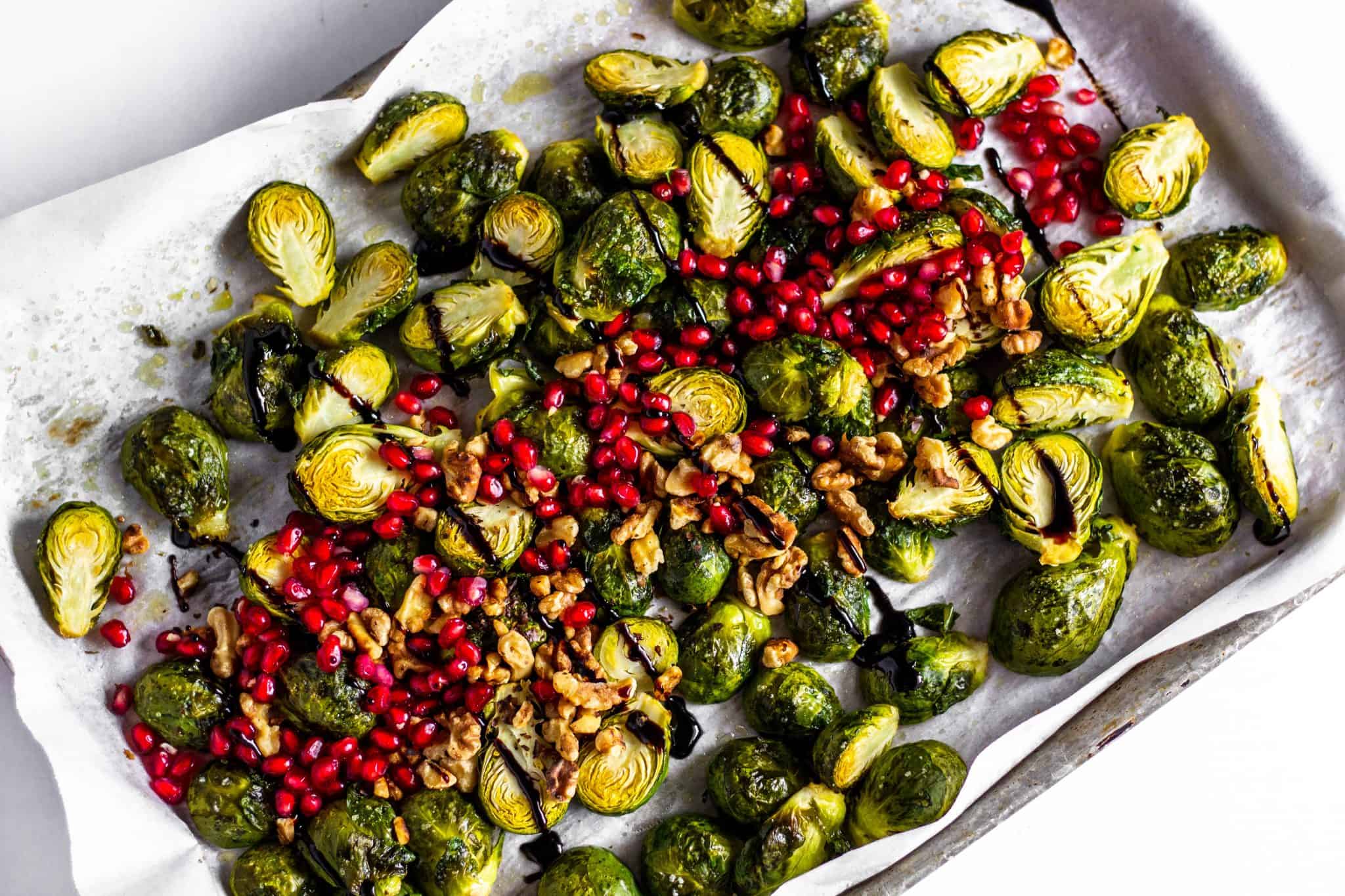 Roasted Brussels Sprouts with Pomegranates and Toasted Walnuts #pomegranate #brusselssprouts #tararochfordnutrition